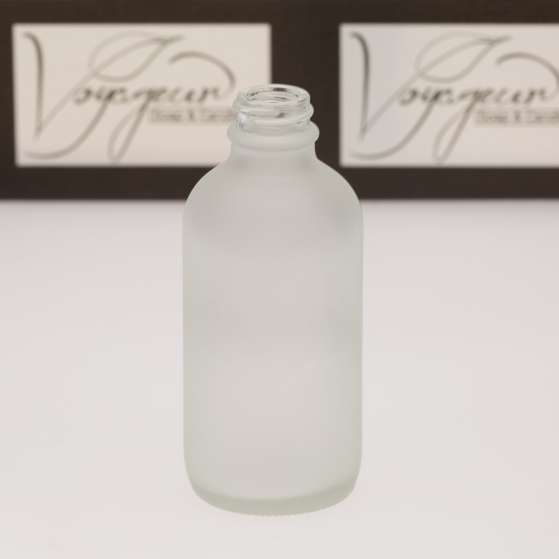 https://www.voyageursoapandcandle.com/cdn/shop/products/4oz-22-400-Frosted-Glass-Bottle-No-Closure.jpg?v=1682811983&width=1946