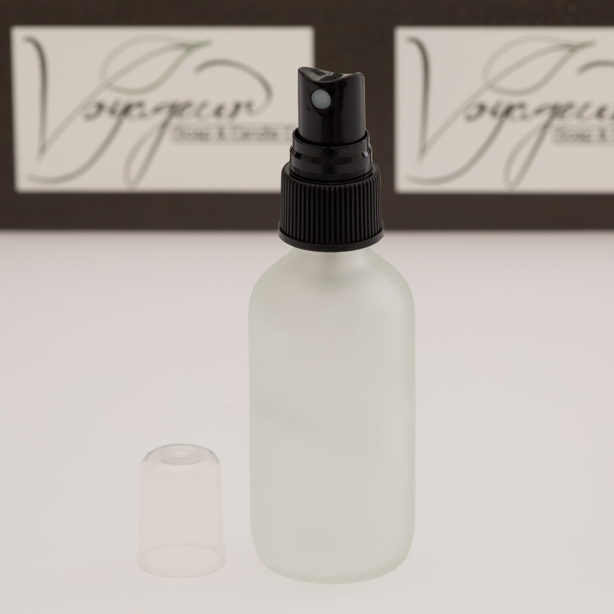 2 oz Frosted Glass Bottle with 20-400 Black Fine Mist Sprayer