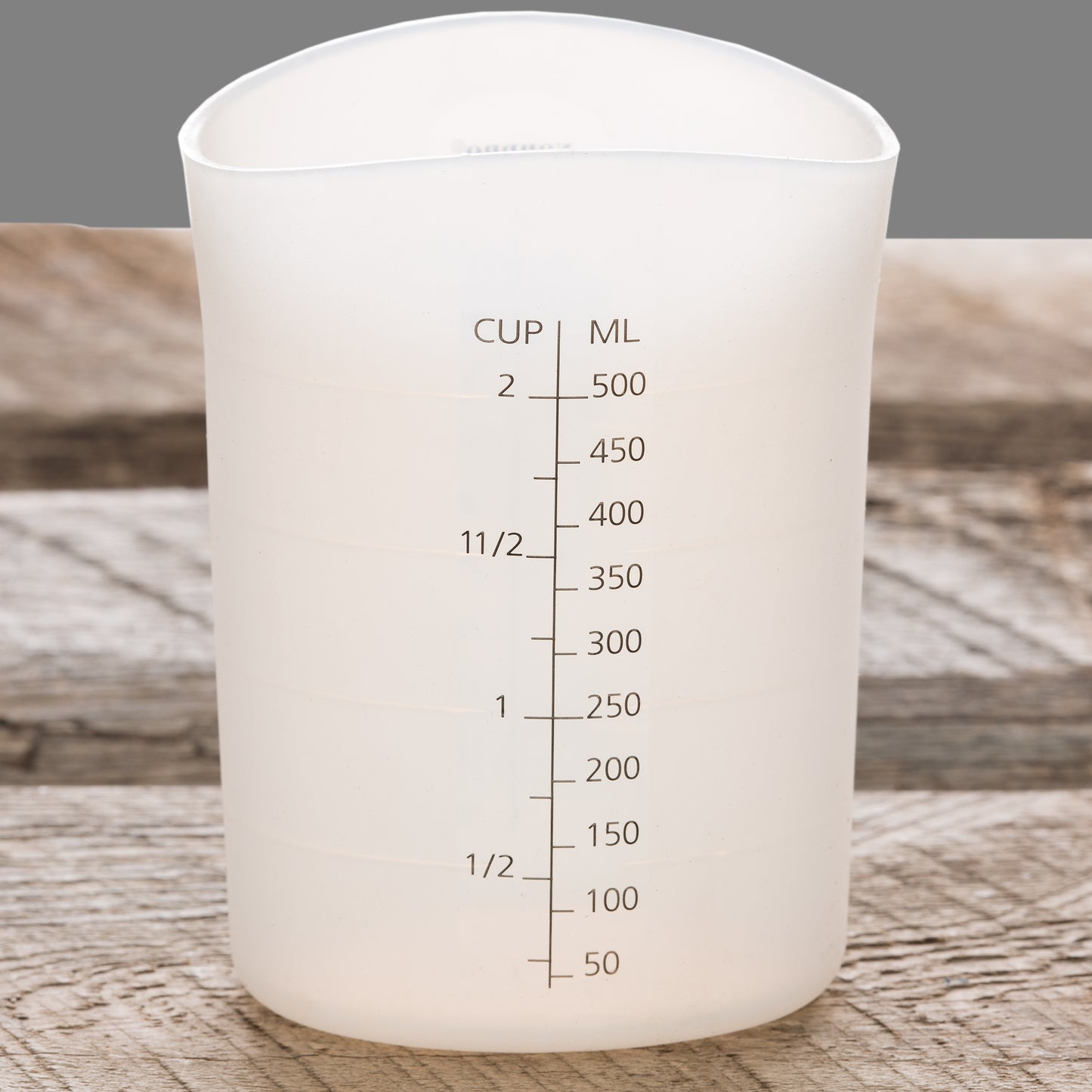 https://www.voyageursoapandcandle.com/cdn/shop/products/Silicone-Measuring-Cup-3.jpg?v=1567892670&width=1445